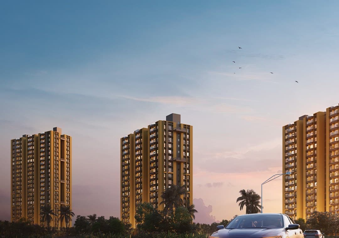 Orizon towers viewed from the tree-lined internal road